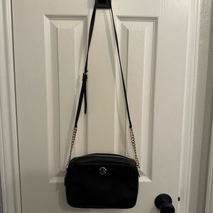 Michael Kors nwt cross body black leather mini bag.